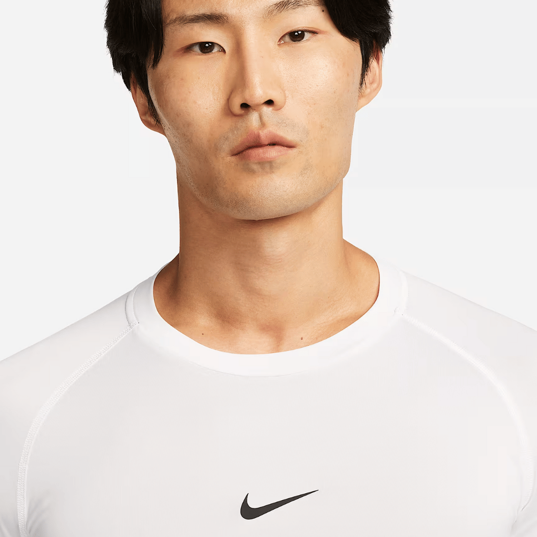 TOP LICRA NIKE PRO DRI-FIT SHORT SLEEVE BLANCO - FB7932100